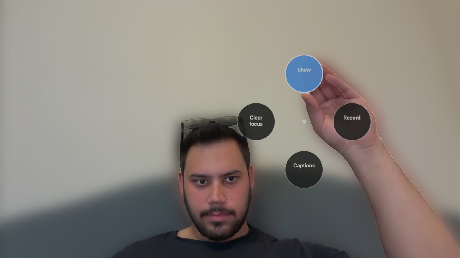 The air command palette: four round buttons around the presenter's hand